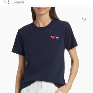 Comme des Garcons Navy Blue Tee with Dual Heart Embroidery
Play series
